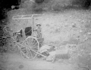 Photo by Phillips of Blumenschein with the broken wheel, September 1898. Courtesy Taos Historic Museums.